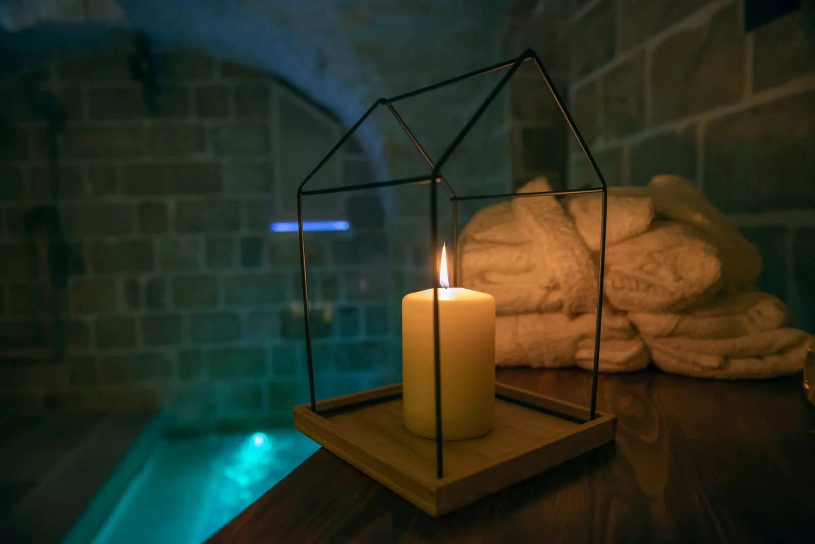 The pool lit by candles